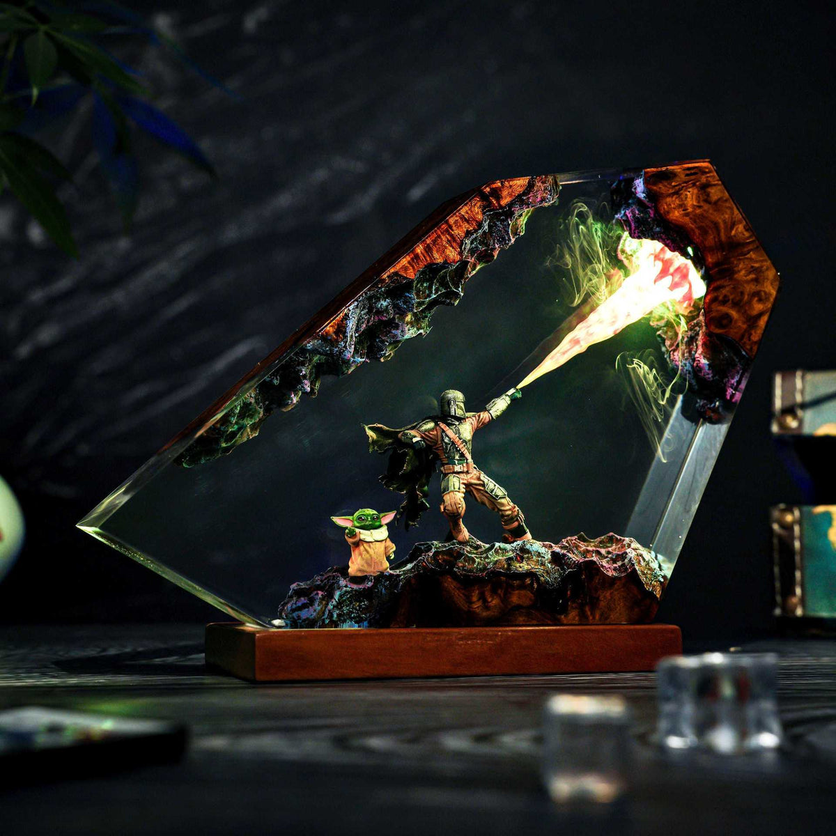 Detail of the figures set inside the clear epoxy