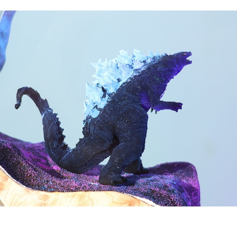 Detail of the figures set inside the clear epoxy