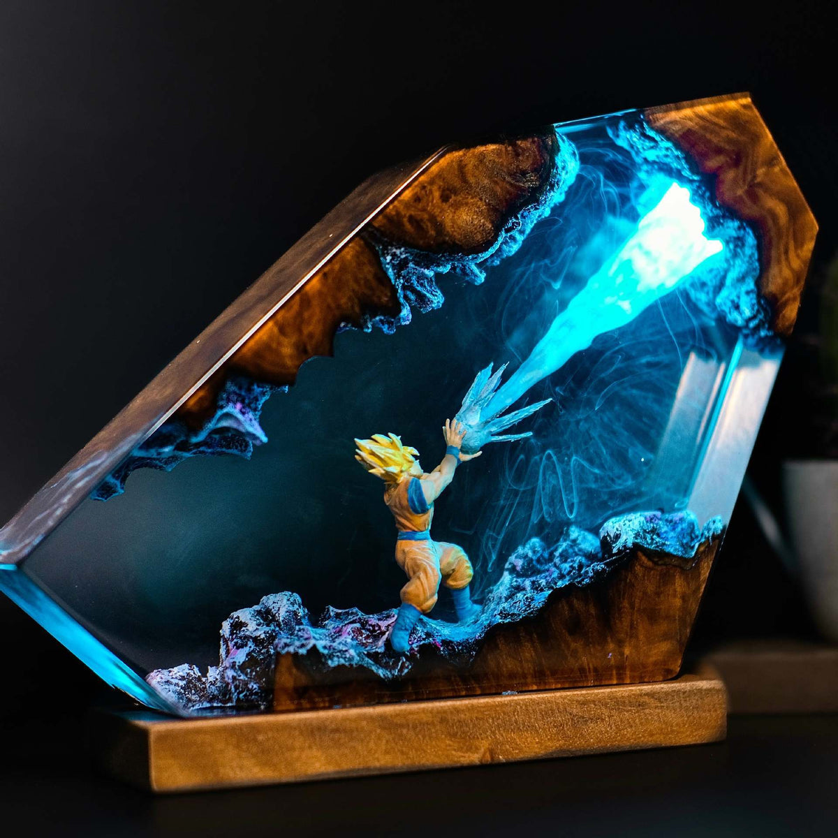 Golden Aura Resin Lamp glowing in a dark room