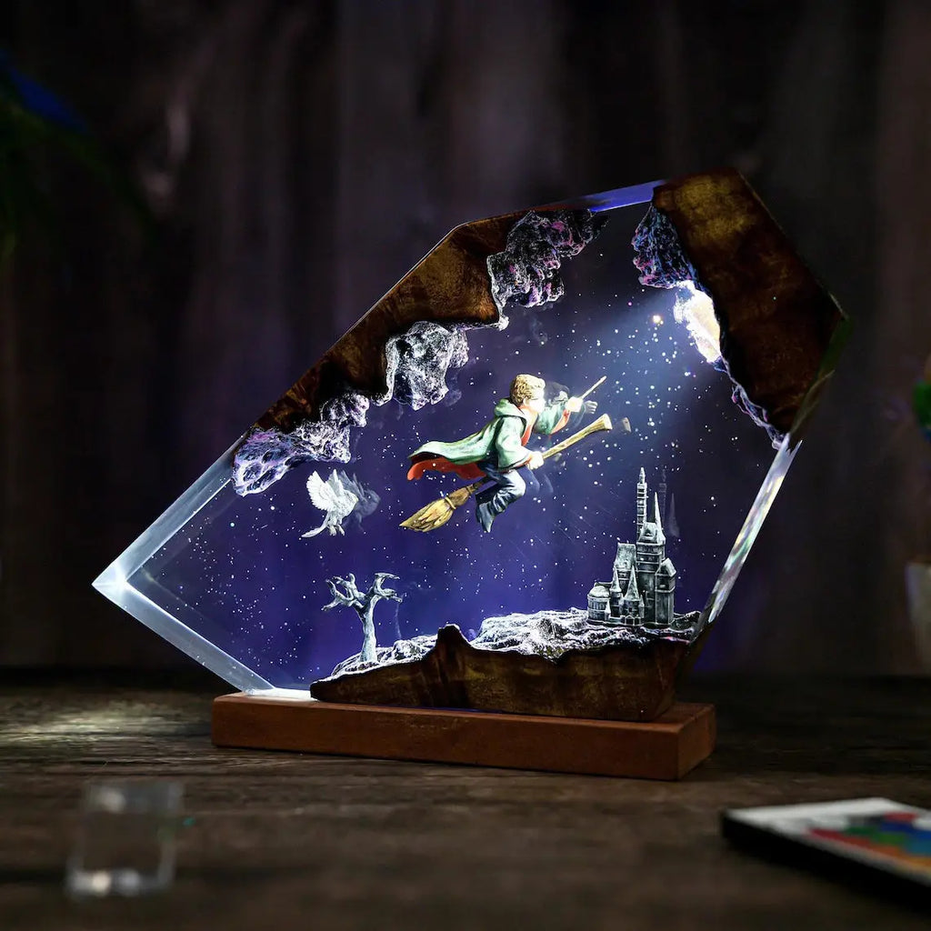 Broomstick Flight resin lamp, angled view